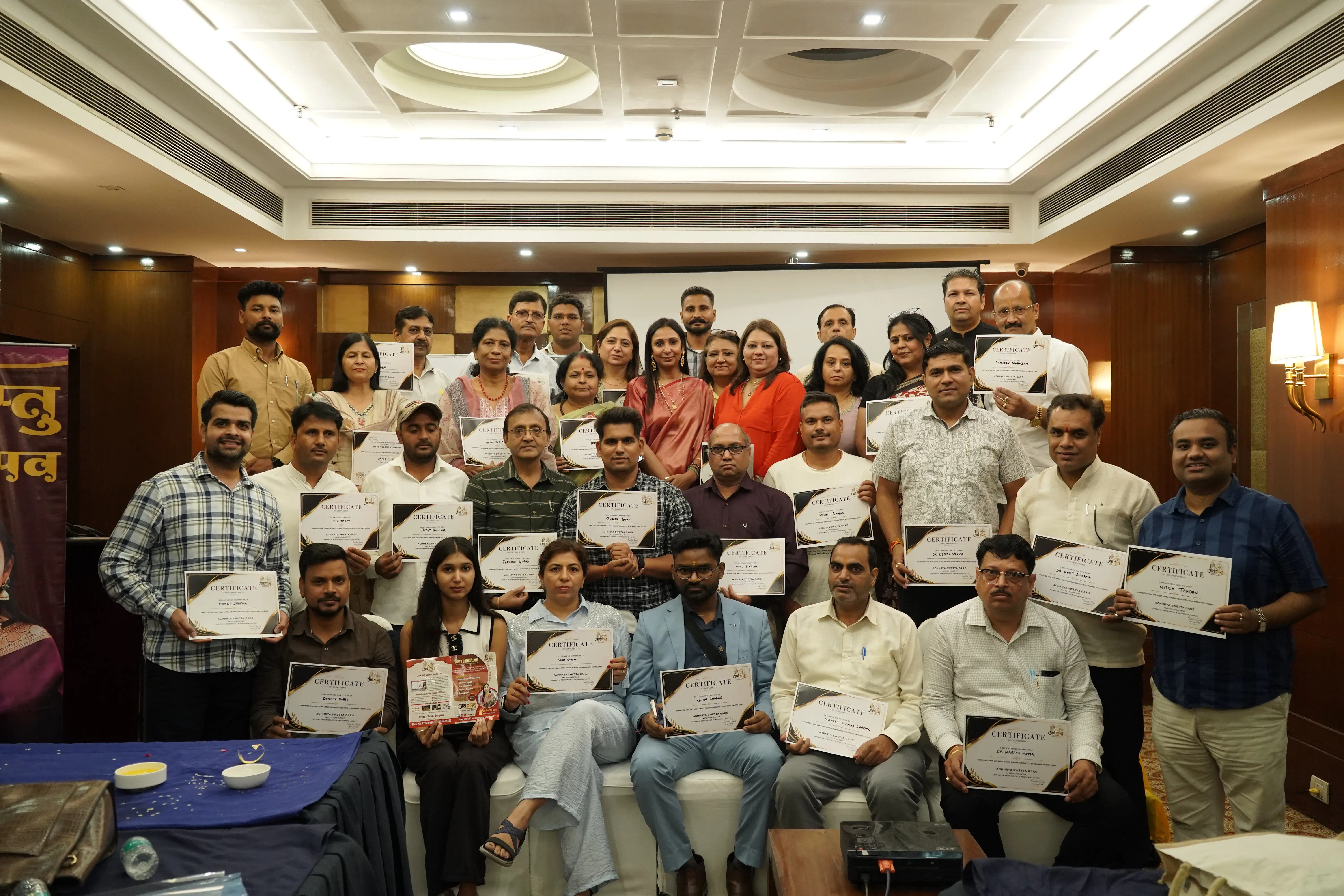 ArthVastu learners gathered with their course completion certificates